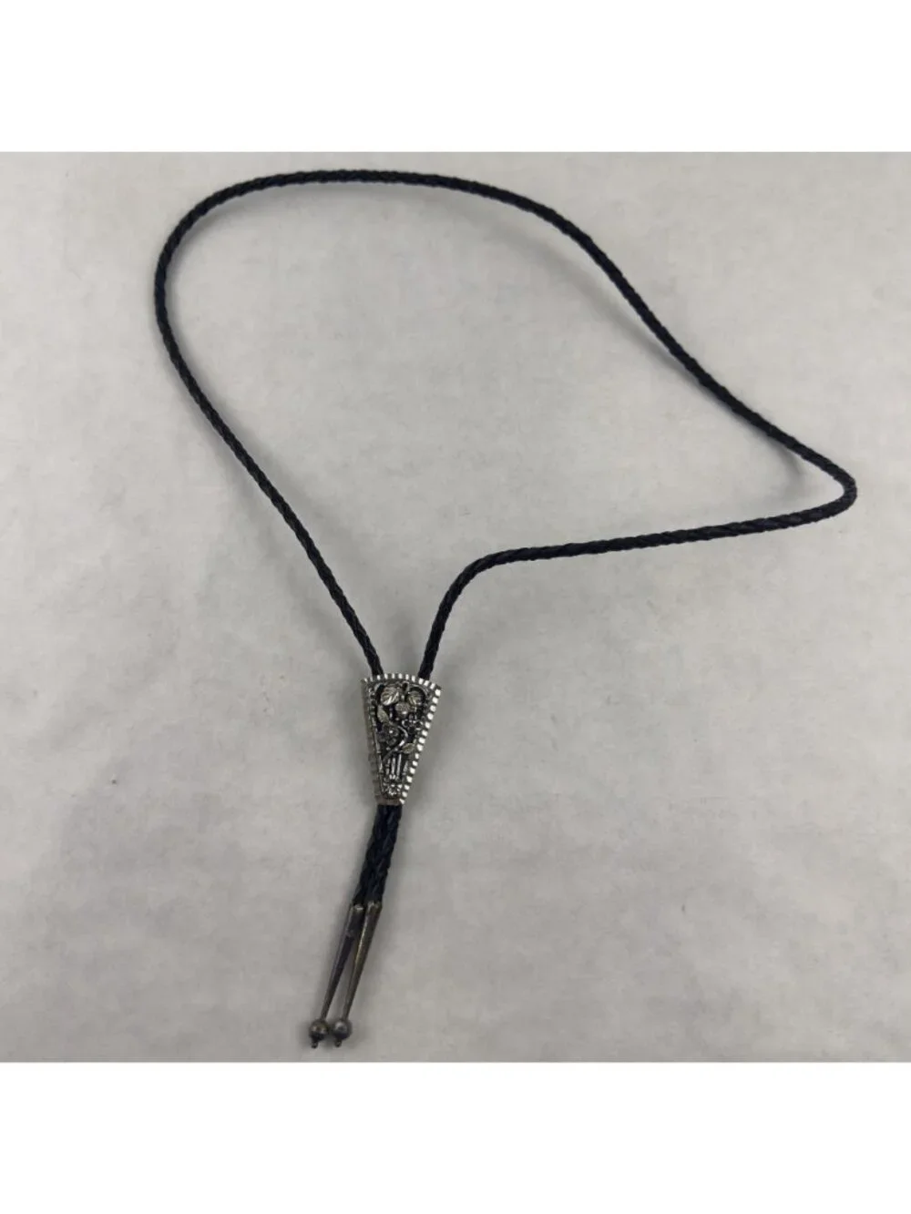 Vtg Black Hills Sterling Silver Bolo Tie Floral Silver Tips Braided Leather USA
